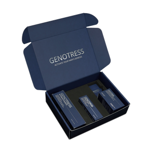 Luxury unboxing view of the Genotress ActiveRoot Clinical Hair Growth System inside a custom midnight blue mailer box. The complete protocol for thinning hair rests in precision foam inserts below silver text reading "Activate Your Hair's Genesis