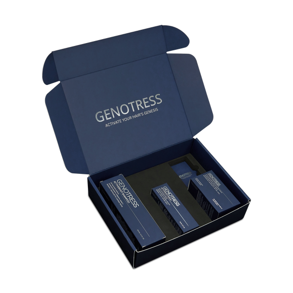 Luxury unboxing view of the Genotress ActiveRoot Clinical Hair Growth System inside a custom midnight blue mailer box. The complete protocol for thinning hair rests in precision foam inserts below silver text reading "Activate Your Hair's Genesis
